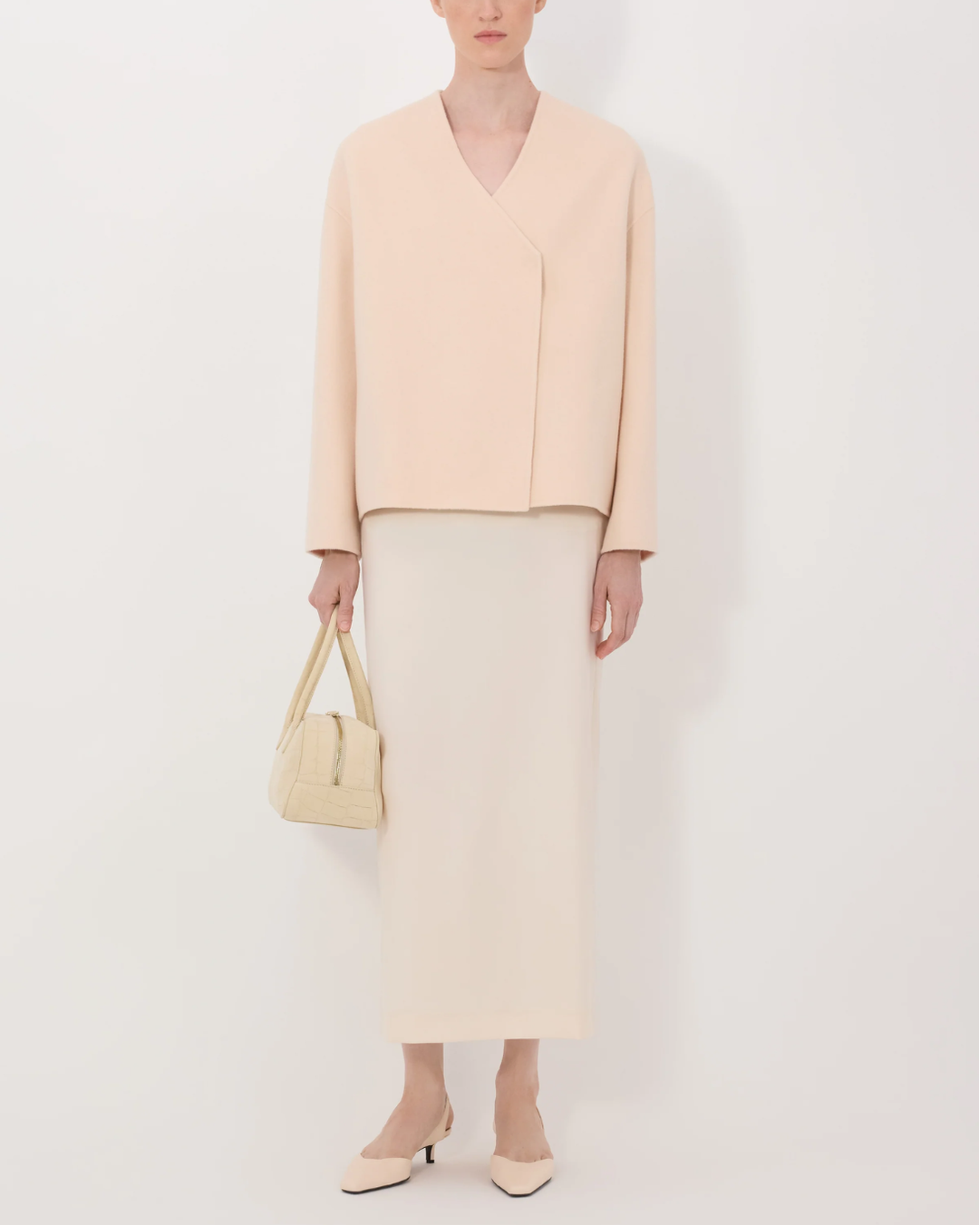 Maara Oval-Shaped Jacket | Cream Rose