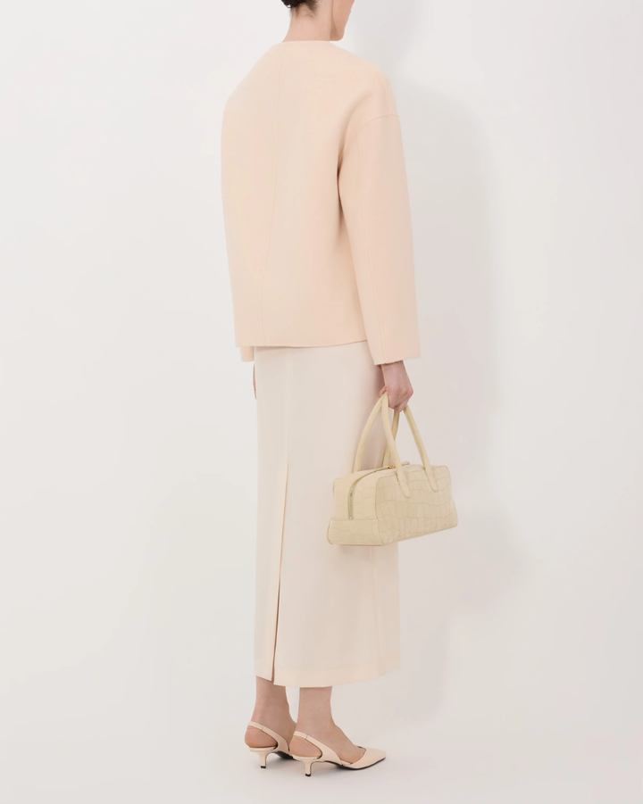Maara Oval-Shaped Jacket | Cream Rose